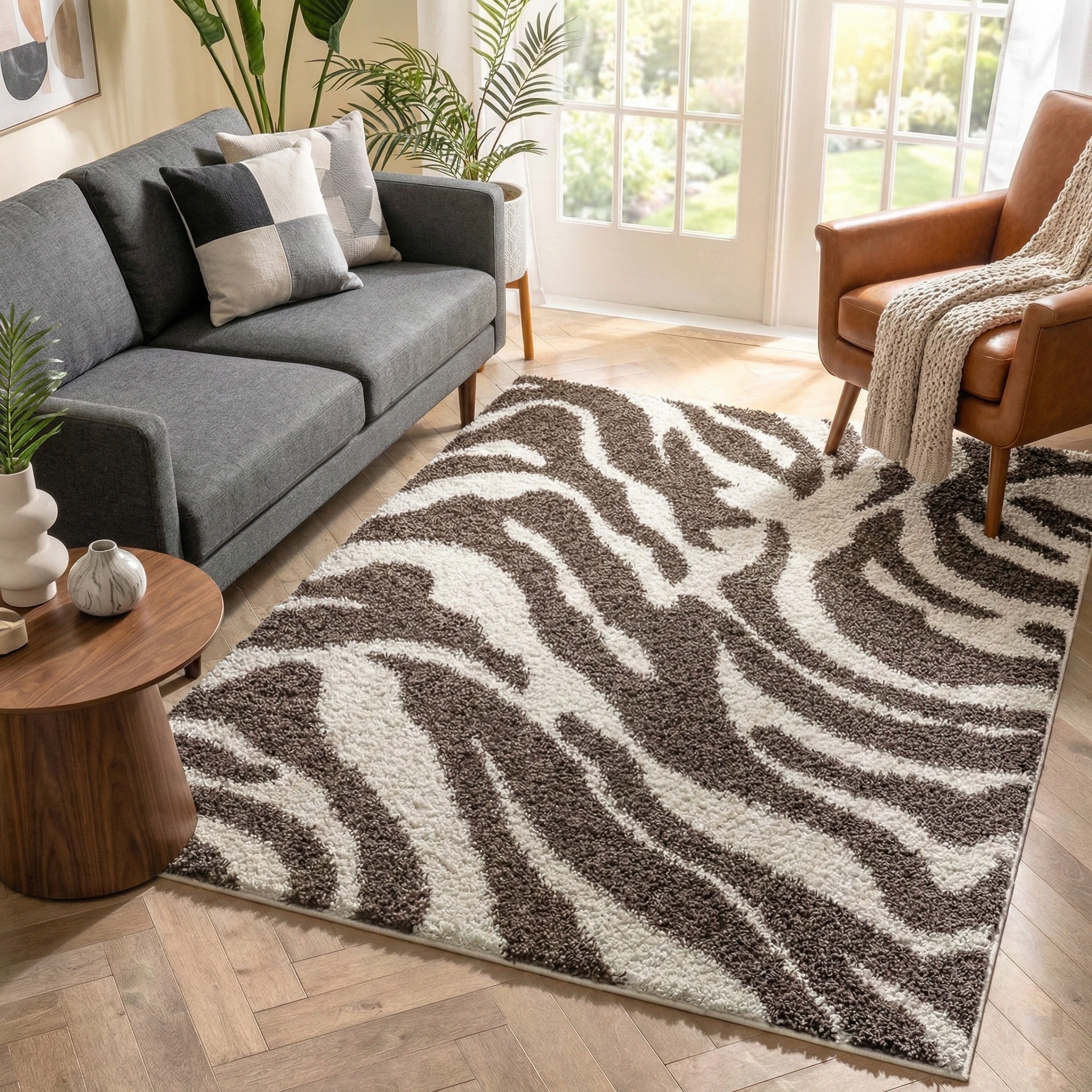 7038 - Living room with a brown zebra pattern rug, gray sofa, and brown armchair.