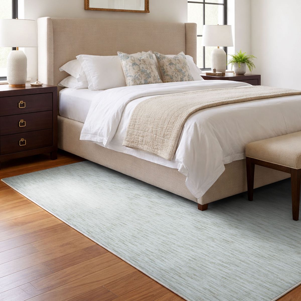 COD-12 Well Woven Moor Washable Rug - Neatly made bed in a bedroom with a plush heathered ivory rug on the floor.