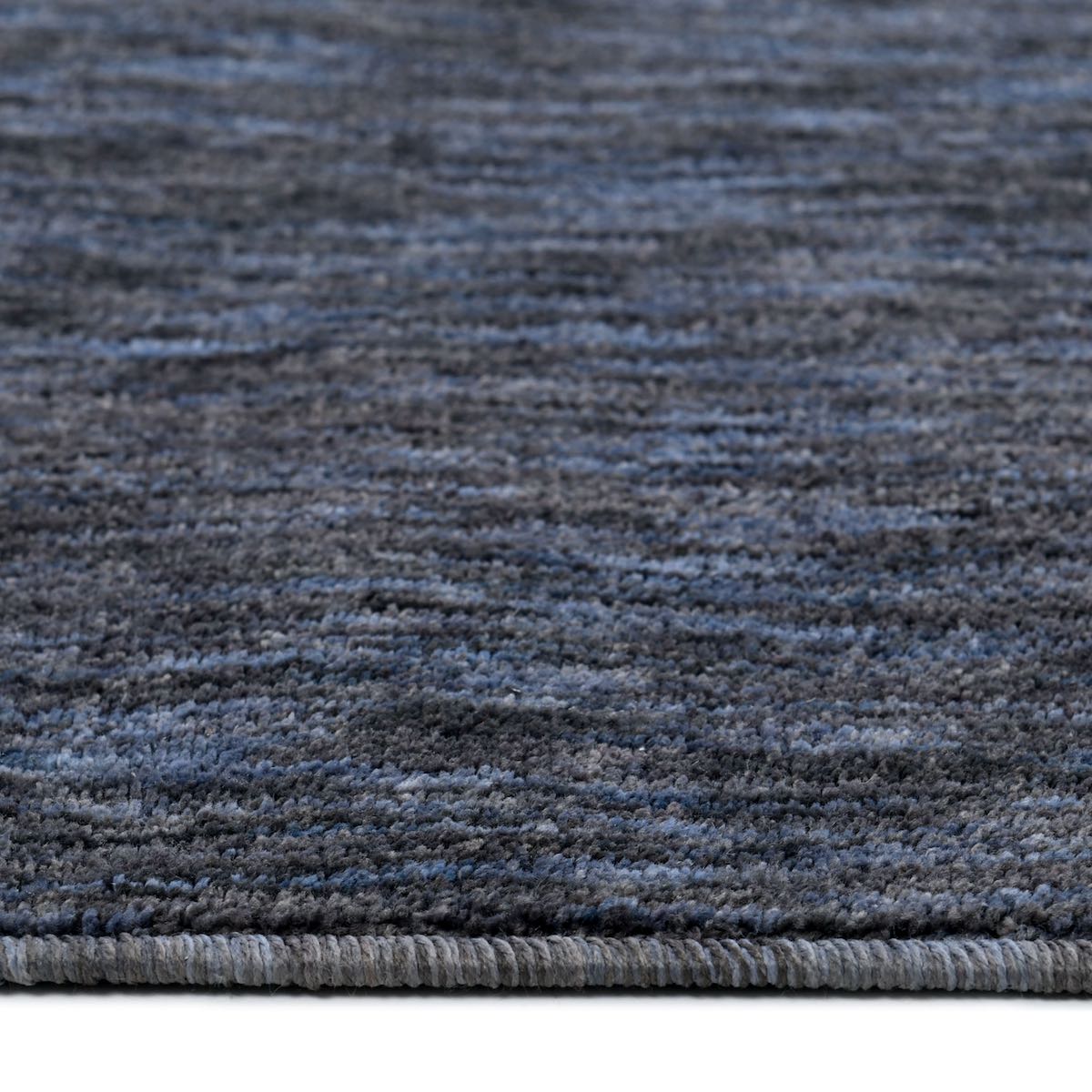 COD-13 Well Woven Moor Washable Rug: Close-up of the textured charcoal and steel blue rug pile
