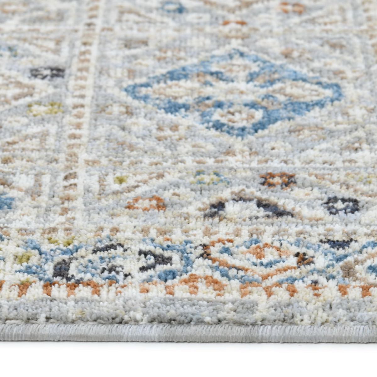 COD-21 Well Woven Mere Washable Rug: Close-up of a soft washable rug with neutral tones and subtle colors.