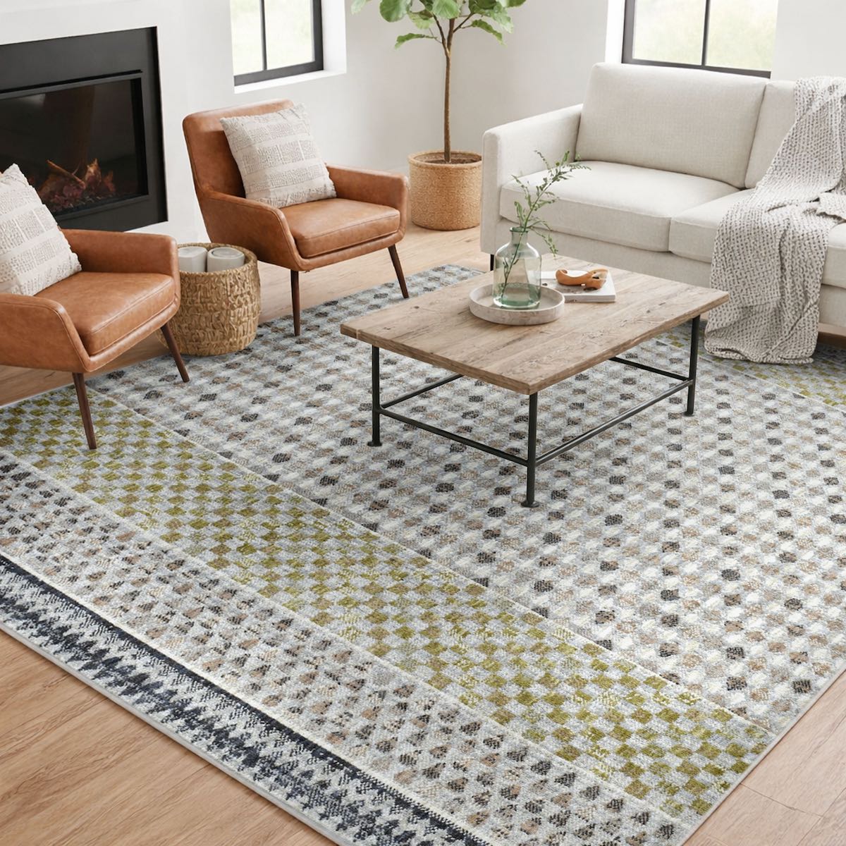 COD-31 Well Woven Wynn Washable Rug - Living room with checker patterned rug, brown chairs, and a coffee table.