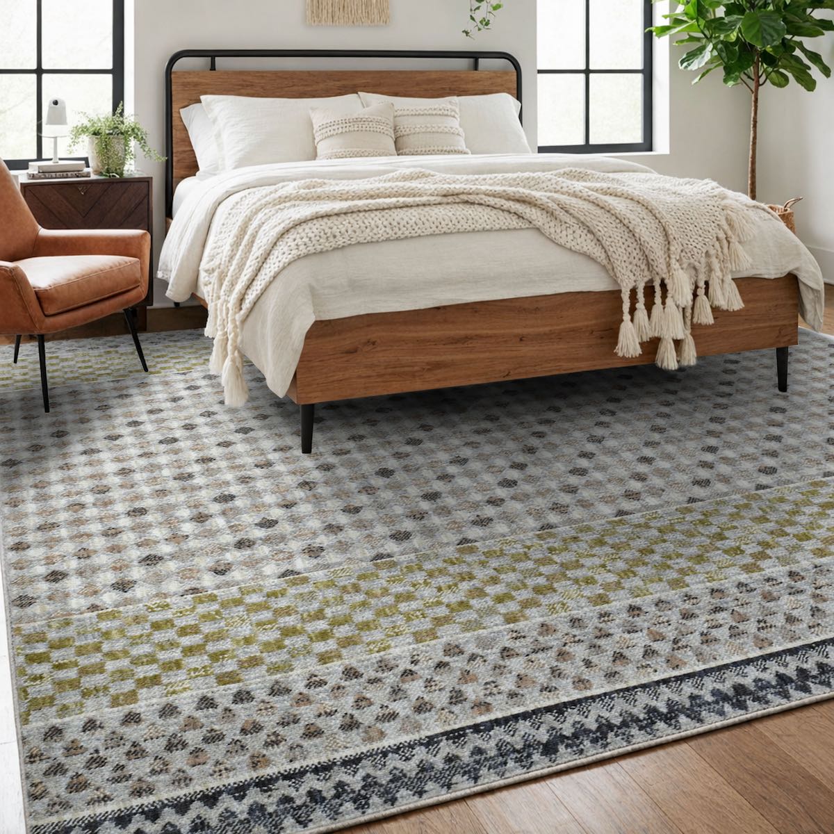 COD-31 Well Woven Wynn Washable Rug - Bedroom with a wooden bed, white bedding, and a patterned rug with large stripes of geometric shapes