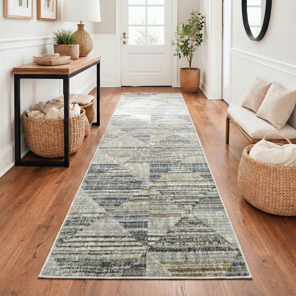 ELM-11-R - Long grey runner rug on a wooden floor with a bench and entryway table featuring a lamp, plants and woven baskets.