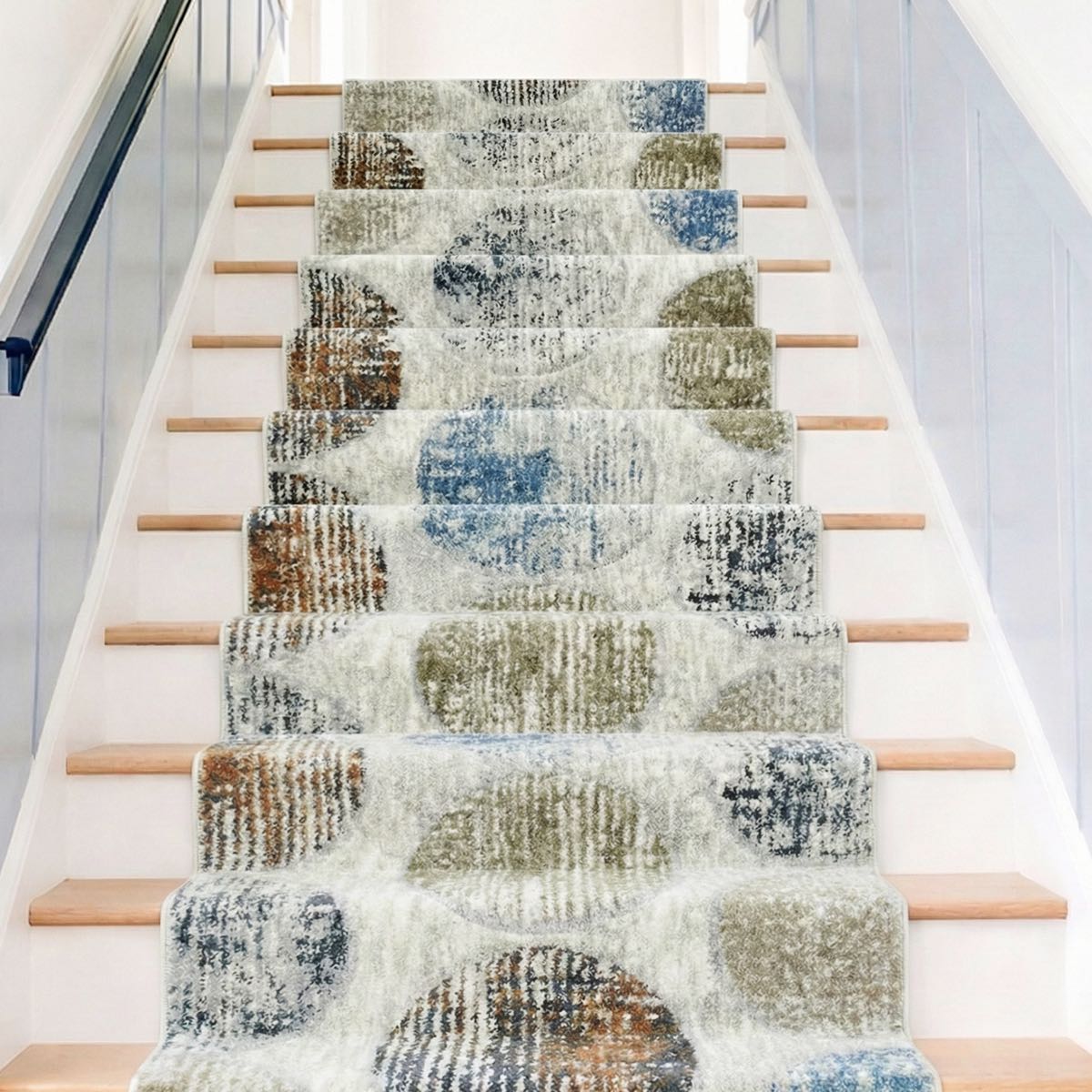 ELM-31 - Staircase with a textured multicolor runner on wooden steps.