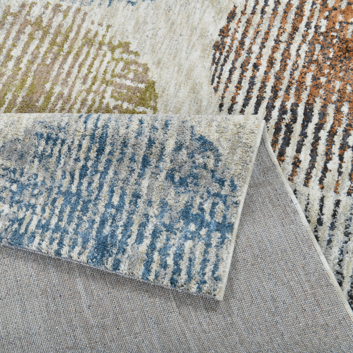 ELM-31 Well Woven Vale Washable Area Rug: Close-up of the washable geometric rug with a focus on texture and color.