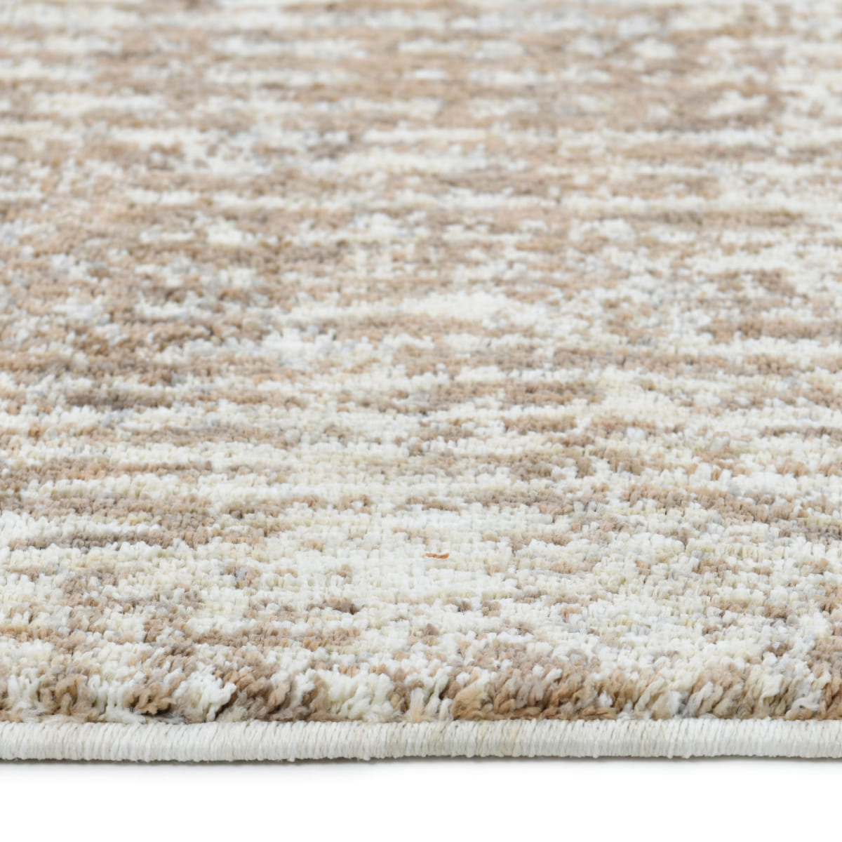 ELM-31 Well Woven Vale Washable Area Rug: Close-up of a textured beige and white rug