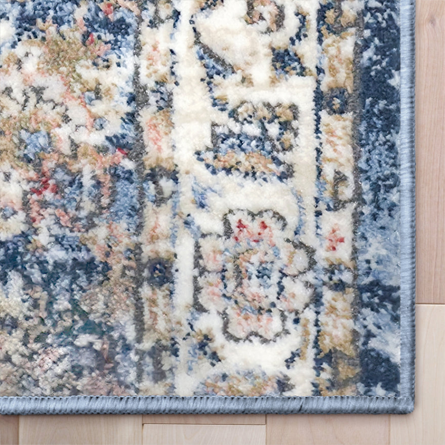 IND-106 Patterned blue area rug on a wooden floor