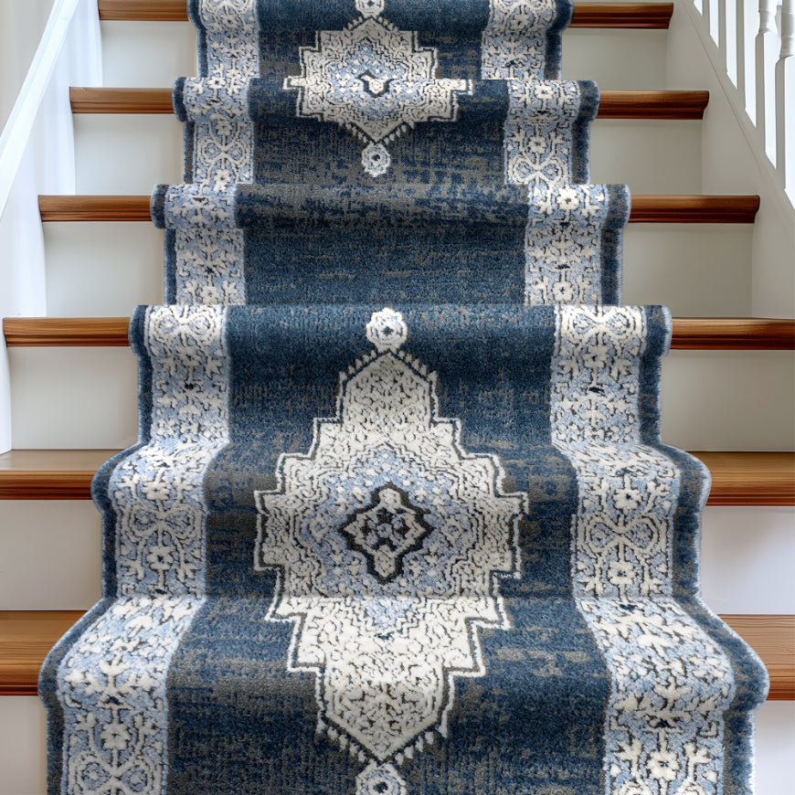 IND-163 Blue patterned stair runner on a staircase with wooden steps.