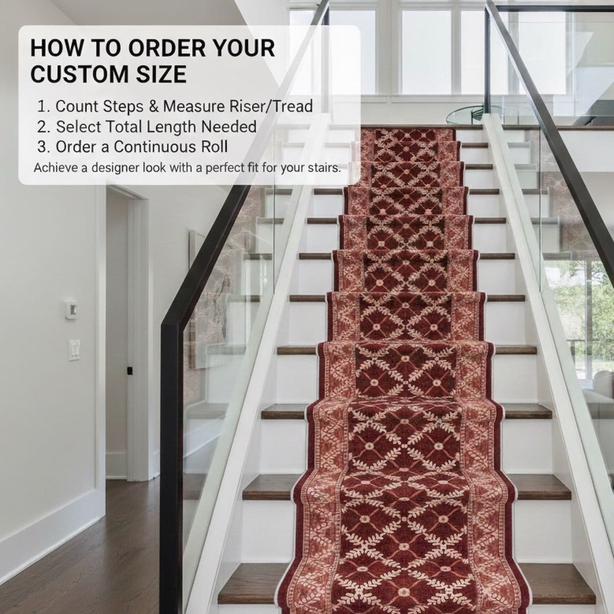 Red patterned stair runner rug installed on modern staircase with wood treads and glass railing. The red runner is Apollo Regency Lattice Ruby Ember from Well Woven.