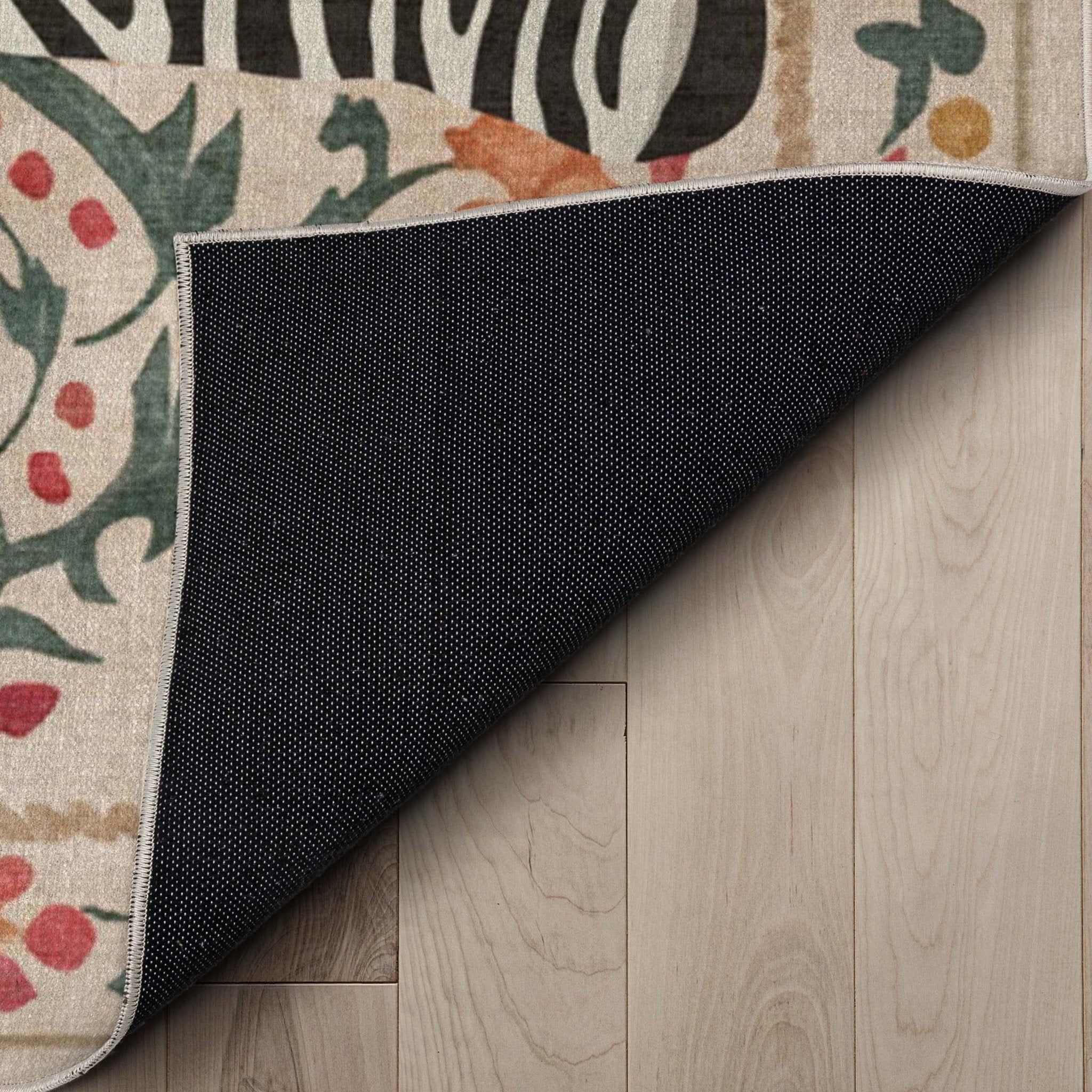 A detail image showing the soft backing of the Zebra's Haven Ivory Multi Rug Perfect for Living Room, Dining Room, Bedroom and Kitchen