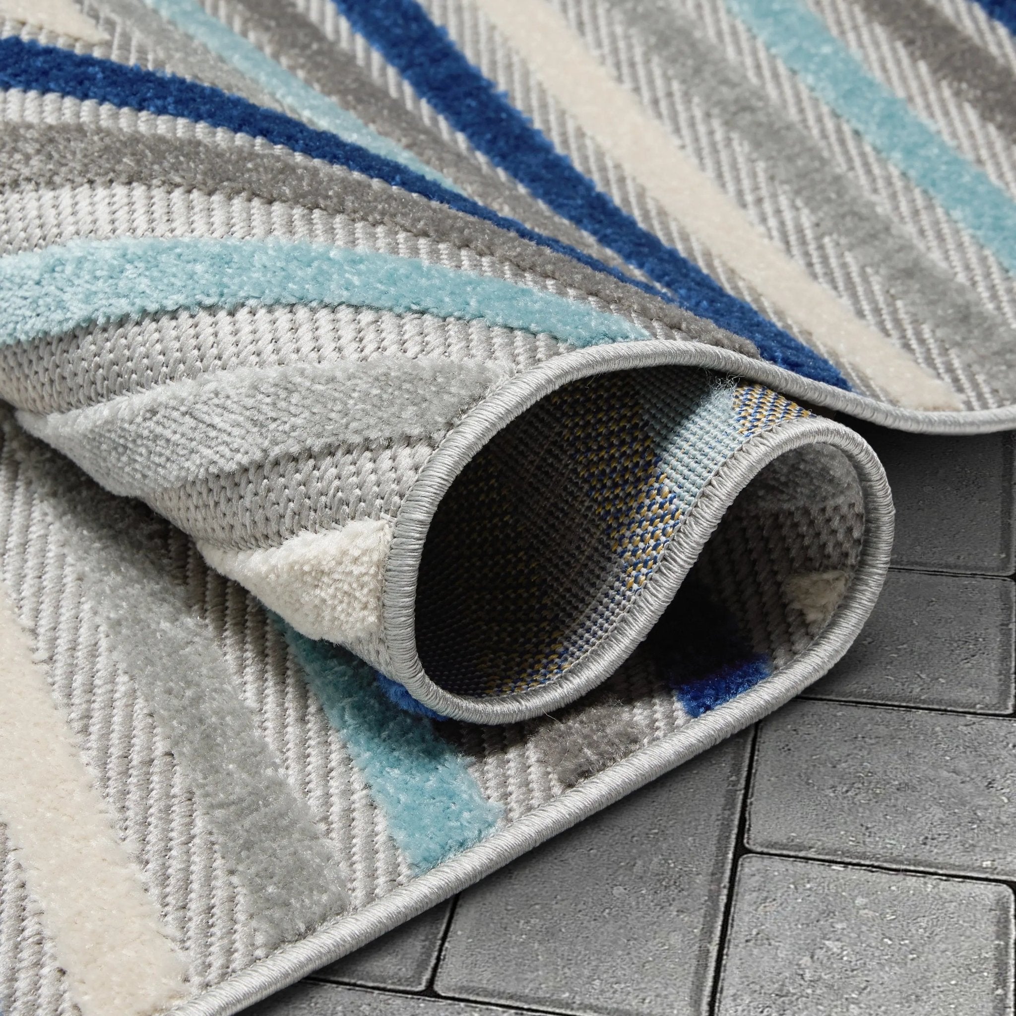 Neema Modern Chevron Striped Indoor/Outdoor Grey Blue High-Low Rug Well Woven
