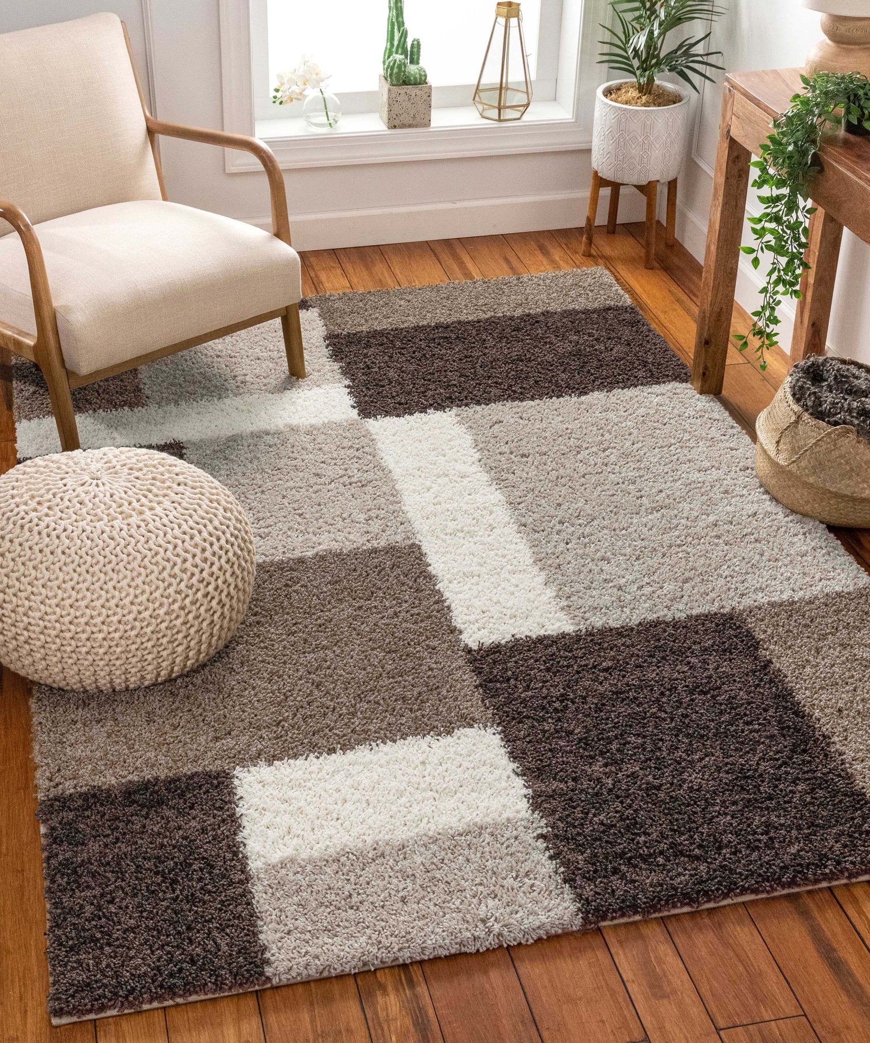 Cubes Beige Brown Modern Geo Rug - Well Woven - A shag rug in a living room, showing its plush texture and square block design.