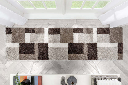 Cubes Beige Brown Modern Geo Rug - Well Woven - Top-down view of the coloblocked runner rug extending across a spacious hallway, emphasizing the repeating geometric block pattern.
