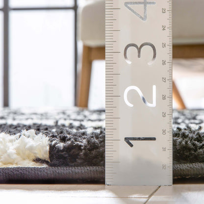 Safari Zebra Black Contemporary Shag Rug - Well Woven - Side profile view with ruler showing the rug's thick, soft pile for scale reference.