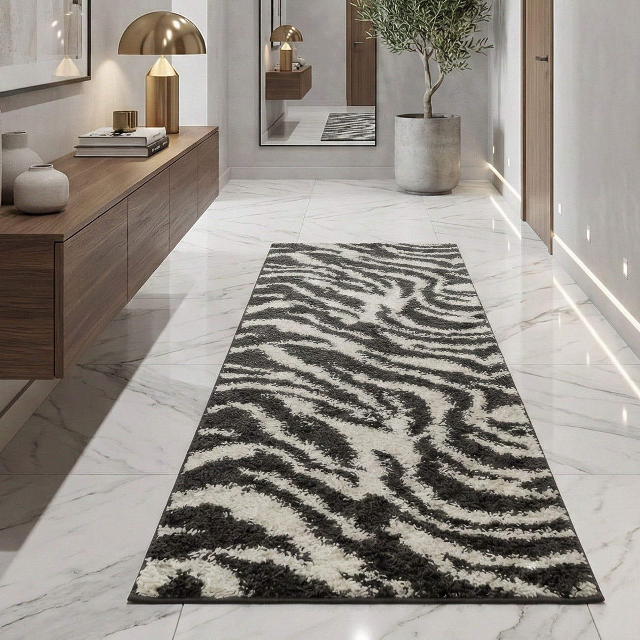 7033 - Zebra patterned rug on a marble hallway floor with a wooden sideboard and decorative items.
