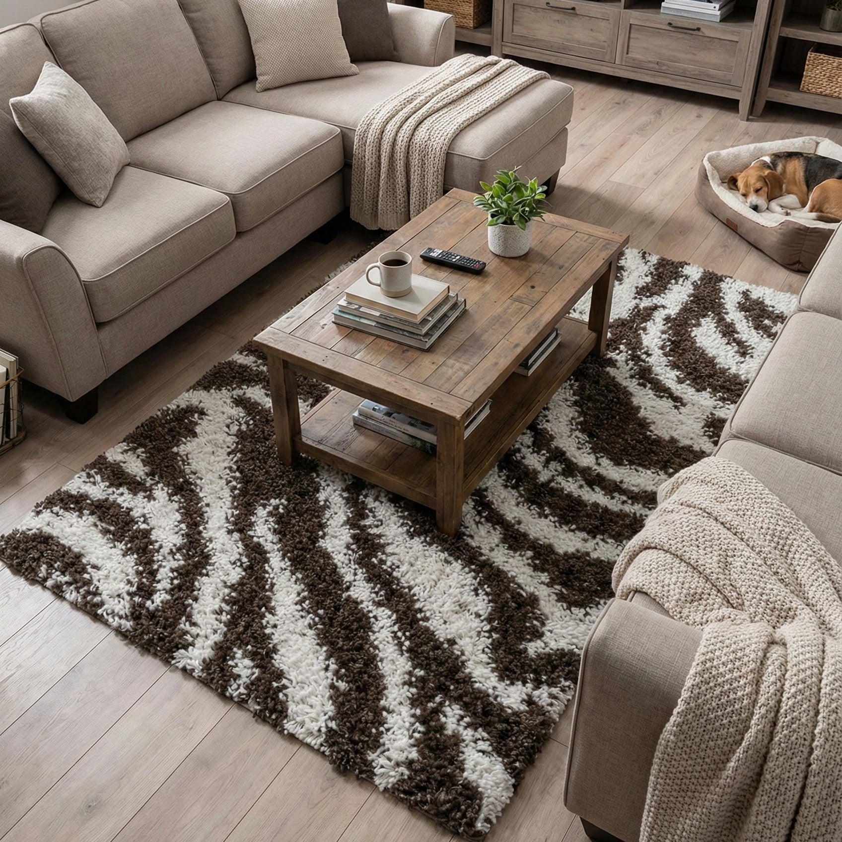 7038 - Living room with a small brown and white patterned rug, wooden coffee table, and beige sectional sofa.