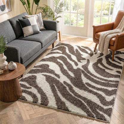 7038 - Living room with a brown zebra pattern rug, gray sofa, and brown armchair.