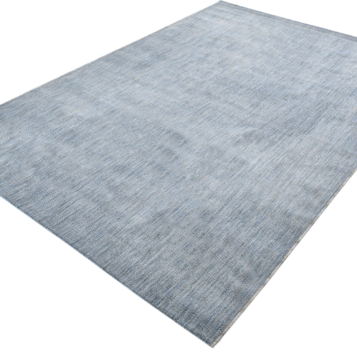 COD-17 Well Woven Moor Washable Rug: Light blue rug with a recycled fiber pile on a white background