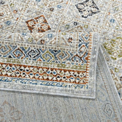 COD-21 Well Woven Mere Washable Rug: Close-up of a multicolor eco-friendly rug with intricate designs and a soft, textured surface.
