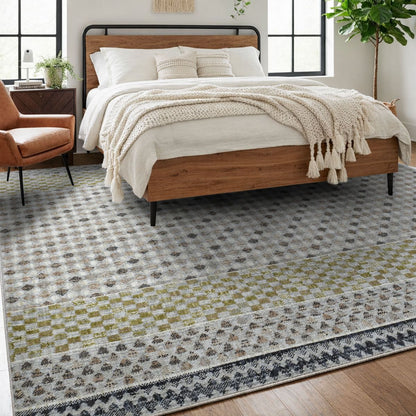 COD-31 Well Woven Wynn Washable Rug - Bedroom with a wooden bed, white bedding, and a patterned rug with large stripes of geometric shapes