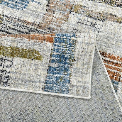 COD-51 Well Woven Fen Washable Rug: Close up of. the multicolored area rug with soft, abstract pattern