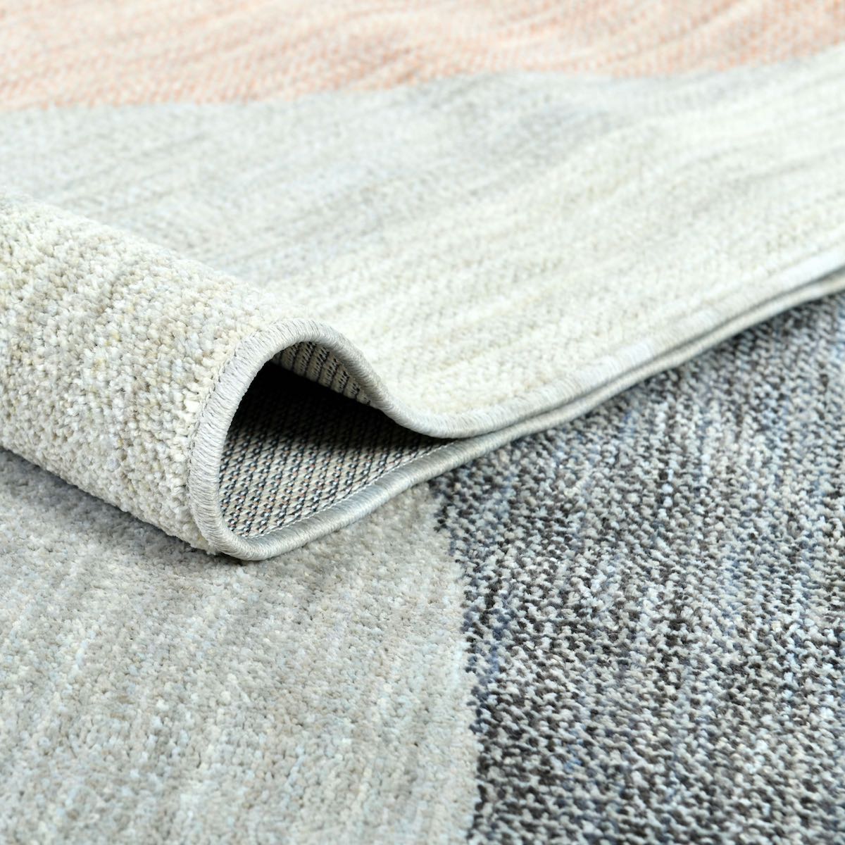 COD-60 Well Woven Holt Washable Rug: close-up of a textured rug with a focus on the pattern and eco-friendly material.
