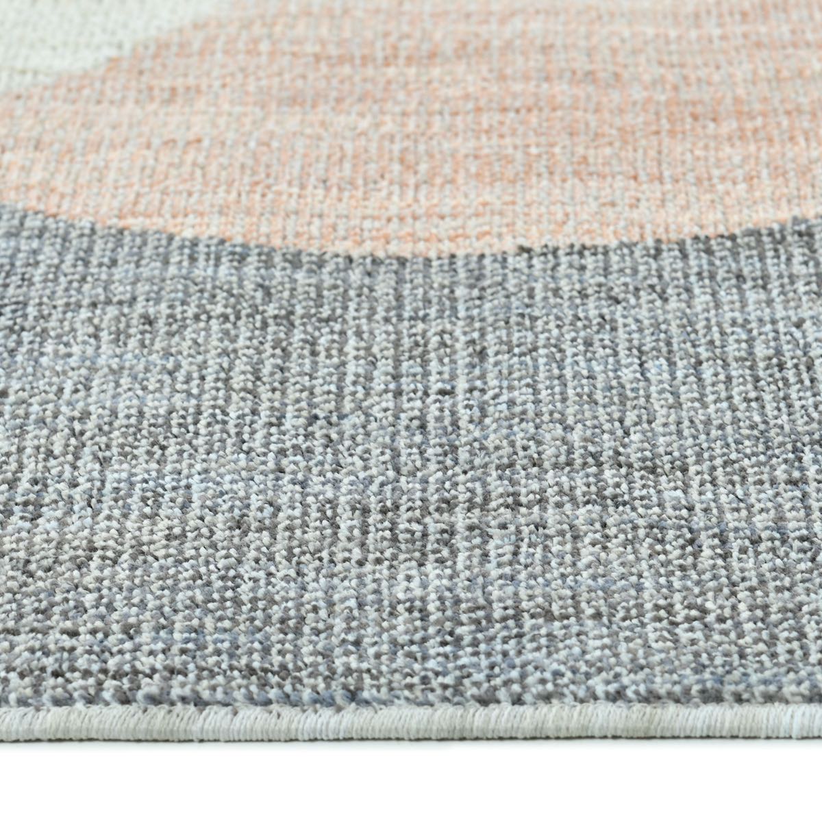 COD-60 Well Woven Holt Washable Rug: Close-up of the soft, textured rug pile with a gradient from pink to gray.