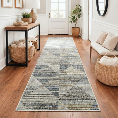 ELM-11-R - Long grey runner rug on a wooden floor with a bench and entryway table featuring a lamp, plants and woven baskets.