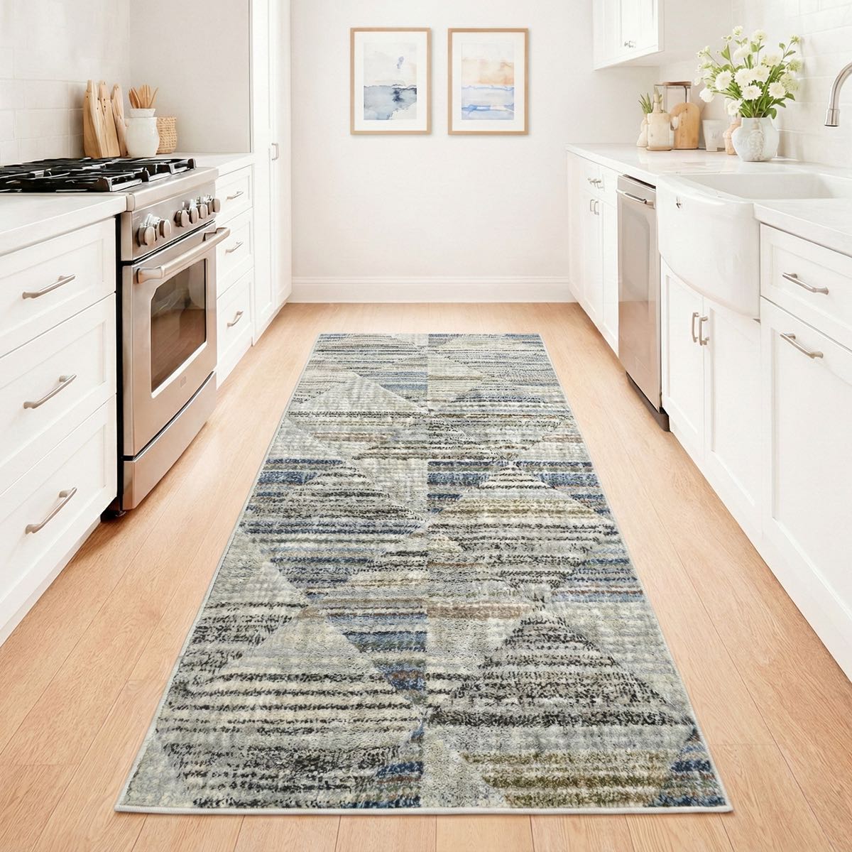 ELM-11-R - Kitchen with a long, geometric multi color runner rug on light wood flooring and white cabinetry