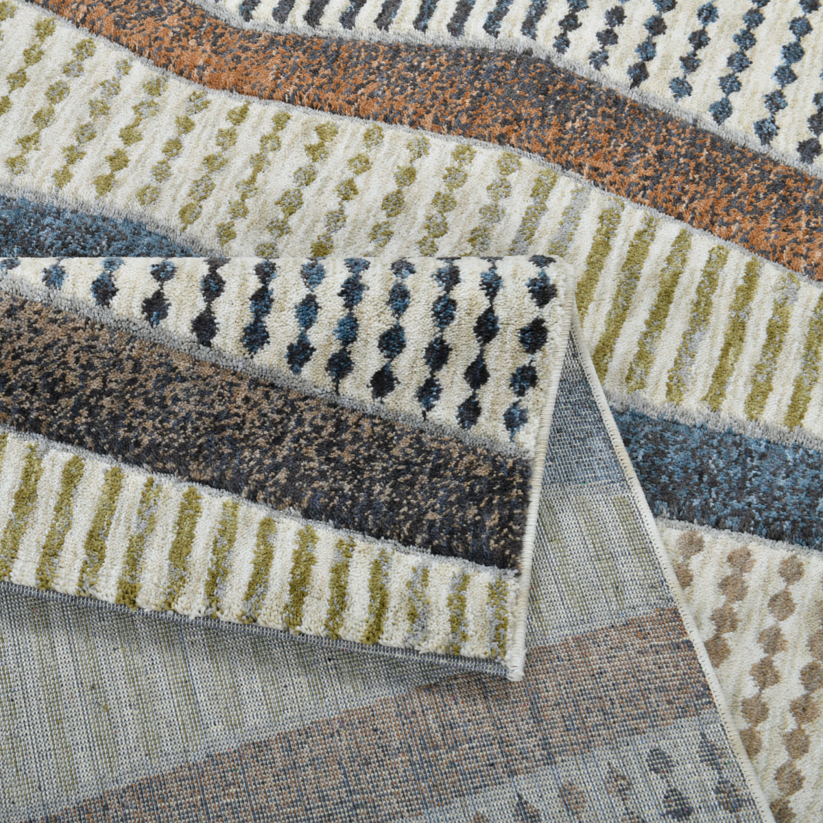 Close-up of the ELM-21 Well Woven Ridge Washable Area Rug texture and pattern