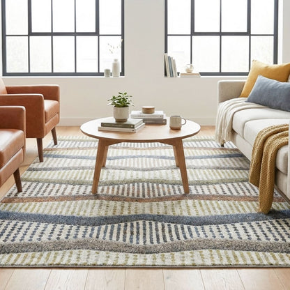 ELM-21 Well Woven Ridge Washable Area Rug: Living room with a geometric washable rug, sofa, armchair, and coffee table.