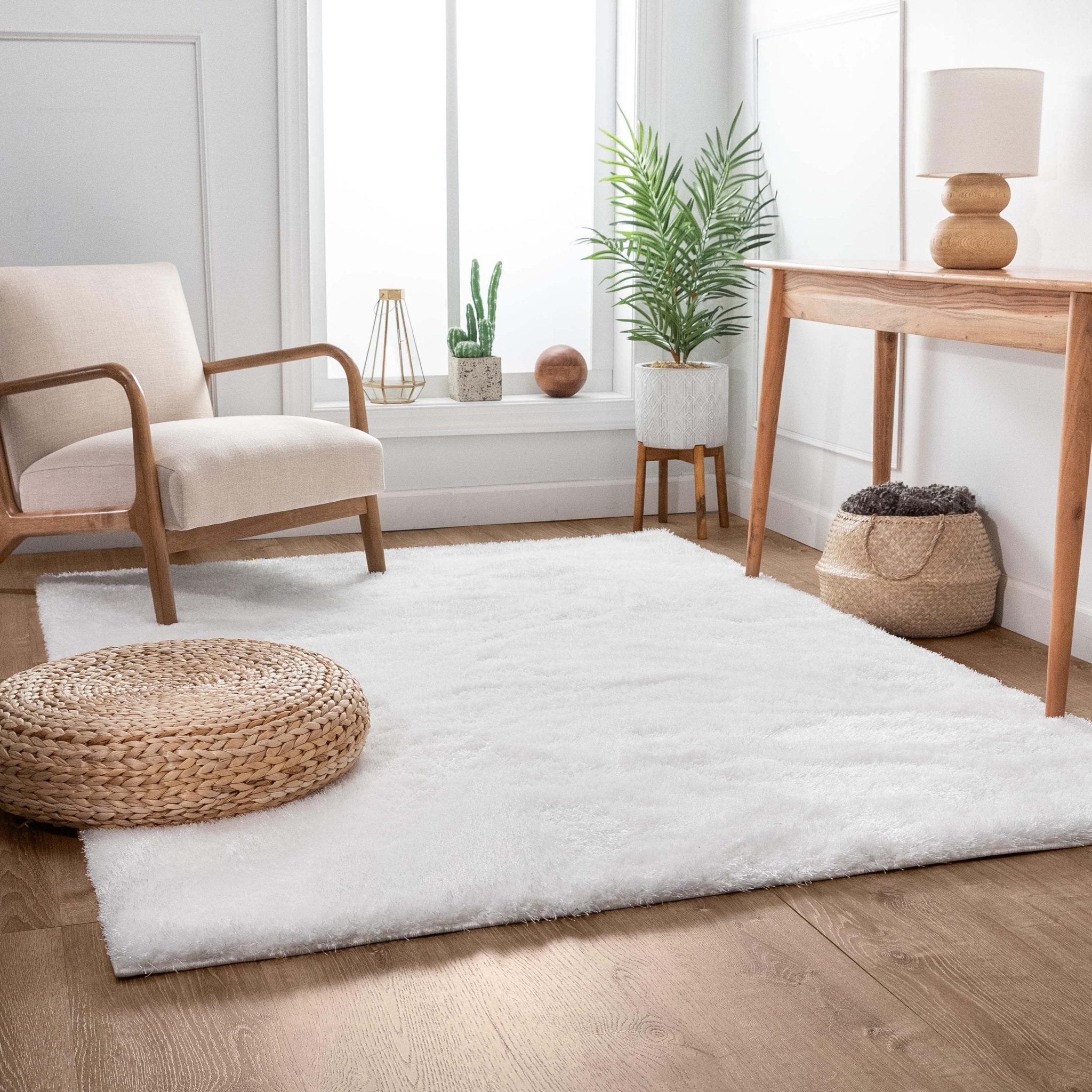 Feather Collection Liza  White Shag Rug –   Sparkly, Plush, Minimalist Glam - Well Woven - solid white shag rug in a living room