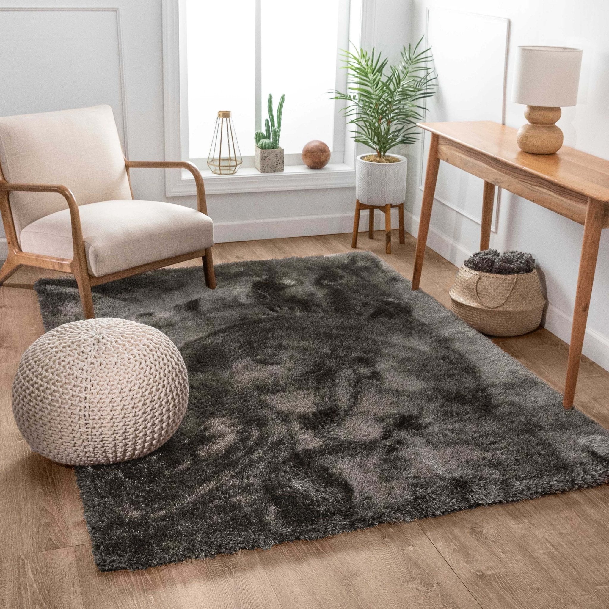 Feather Collection Liza Black Shag Rug –   Sparkly, Plush, Minimalist Glam - Well Woven - black shag rug in a living room