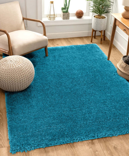 Feather Collection Liza  Blue Shag Rug –   Sparkly, Plush, Minimalist Glam - Well Woven - Teal living room rug