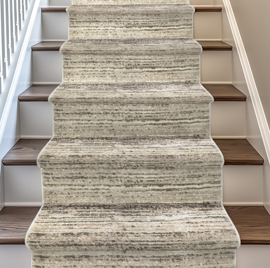 HAR-178 Staircase with a textured beige/taupe carpet runner and wooden steps.