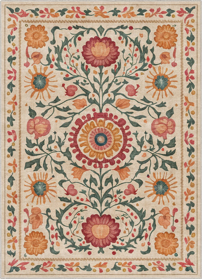 Top-down view of the Apollo Botanical Suzani Rug featuring intricate floral Suzani motifs on a beige background.