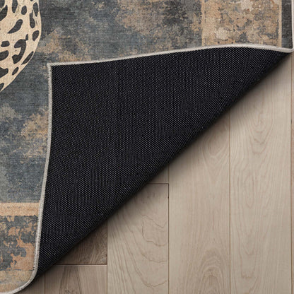 A detail image showing the soft backing of the Leopard’s Reverie Charcoal & Natural Rug