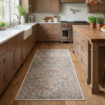 The Emilia Vintage Persian Oriental Ivory Custom Runner Rug by Well Woven adds a soft, classic touch to the warm, light-filled kitchen.