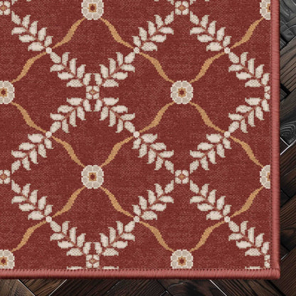 Well Woven - Aldwyn Red Custom Rug - rug corner on a dark wood floor