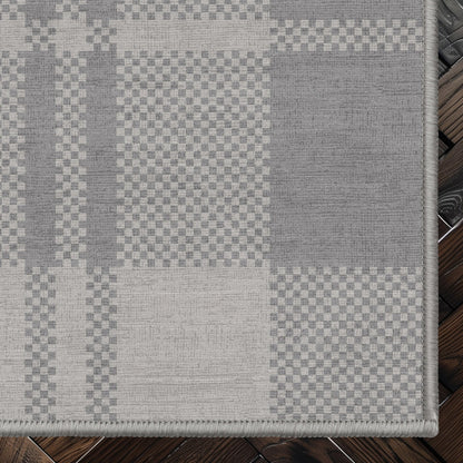 Oswald Custom Rug - Well Woven - grey rug corner on a dark wood floor
