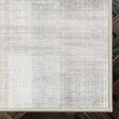 Well Woven - Penda Custom Rug - Cream and Light Grey rug corner on a dark wood floor