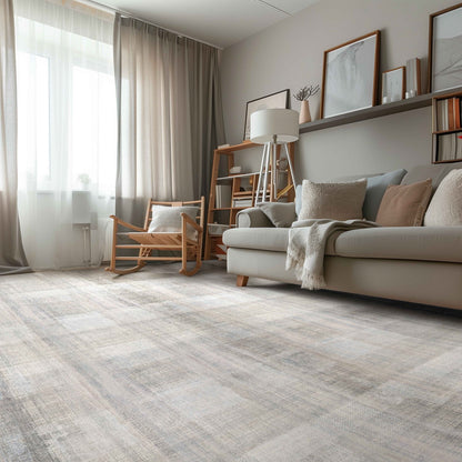 Well Woven - Penda Custom Rug - Cream and Light Grey rug in a living room with a grey sofa