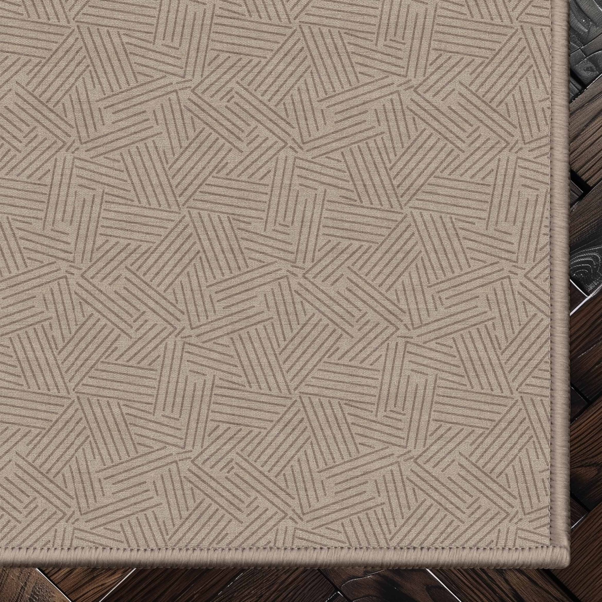 Sigrid Custom Rug - Well Woven - Dark beige geometric rug corner on a dark wood floor