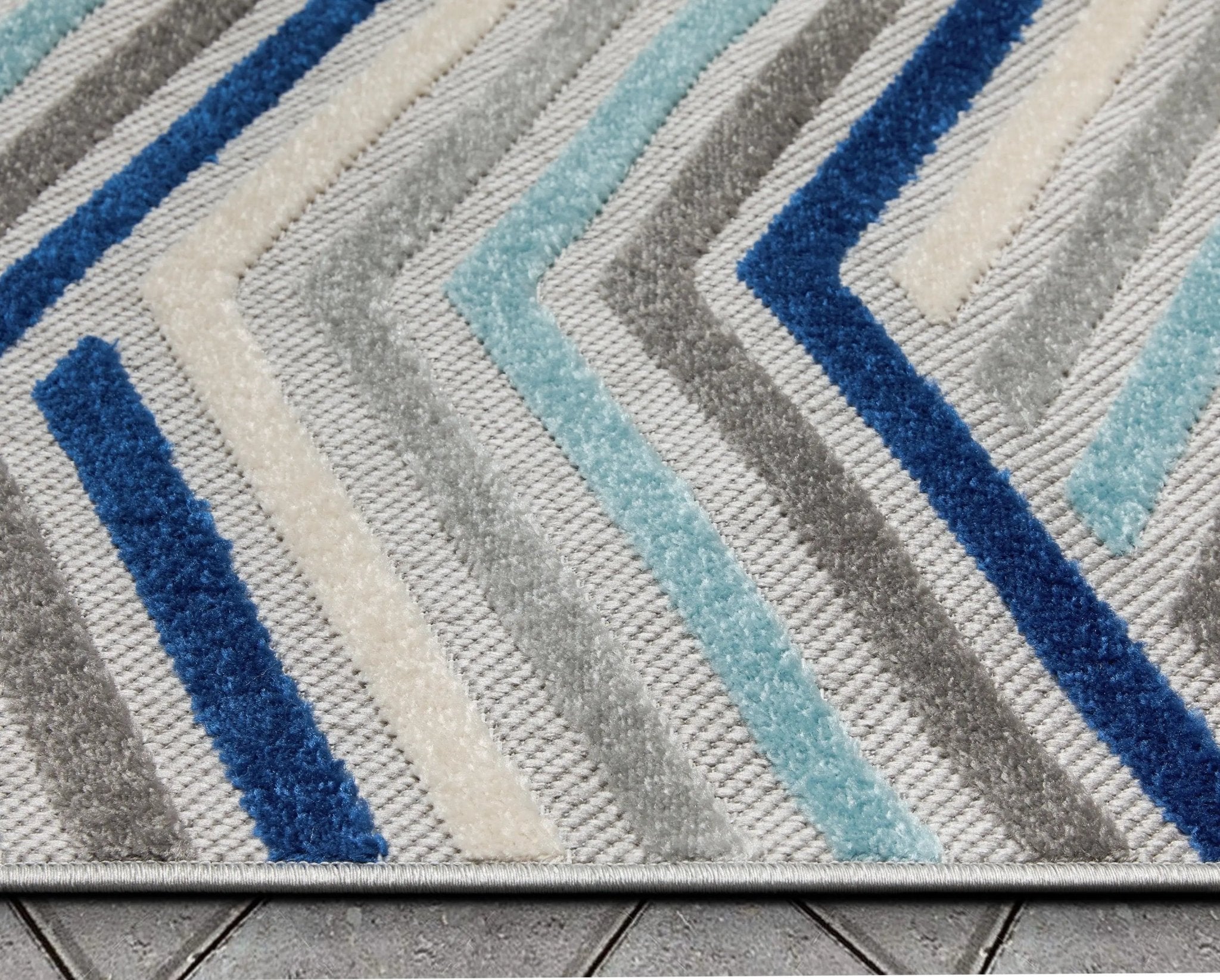 Neema Modern Chevron Striped Indoor/Outdoor Grey Blue High-Low Rug Well Woven