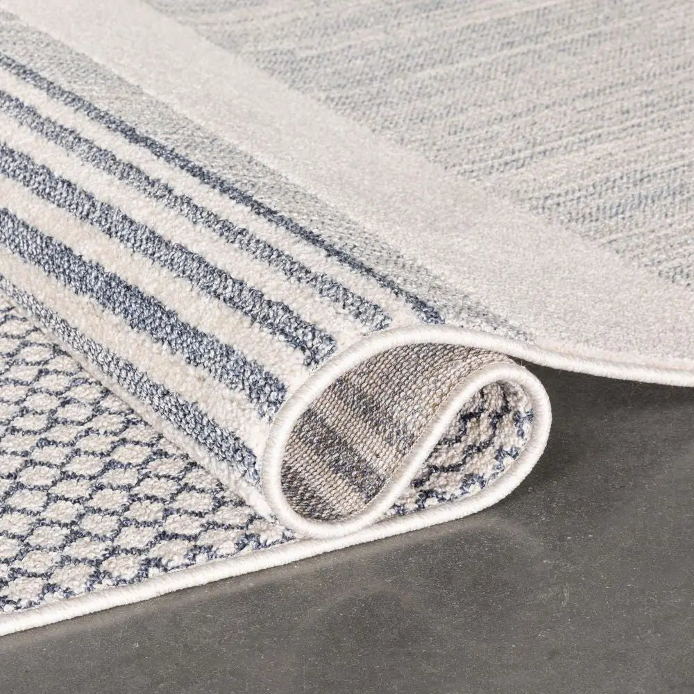 Briar Tribal Geometric Abstract Light Blue Looped Pile Rug Well Woven