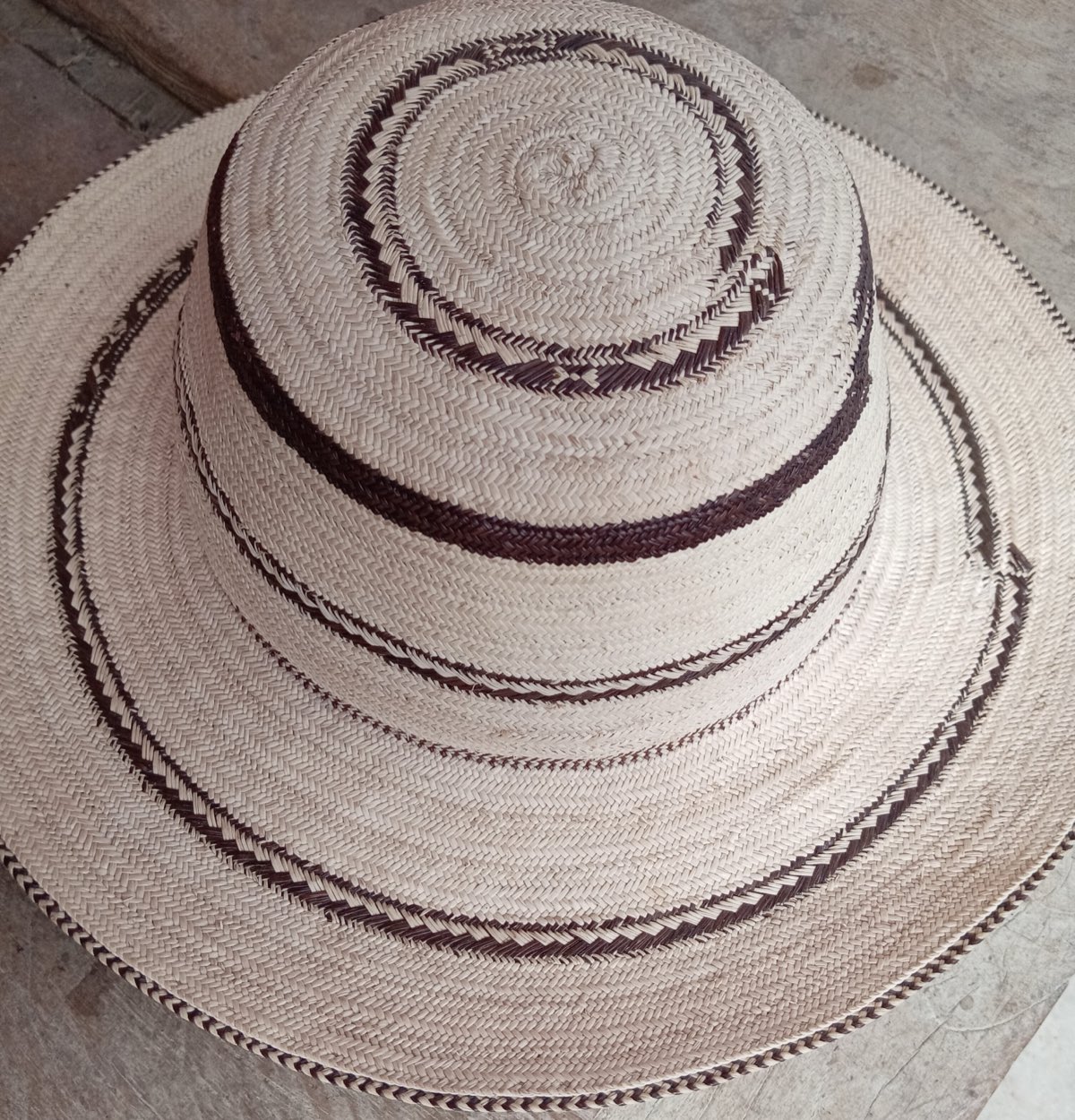 A pinta'o hat at the festival of La Pintada, Panama — braided palm fiber with dark zigzag pintas.